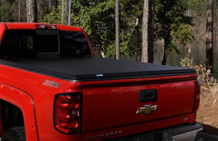 Lund 09-14 Ford F-150 Styleside (6.5ft. Bed) Hard Fold Tonneau Cover – Black
